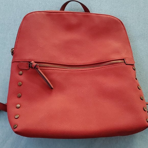 red faux leather backpack